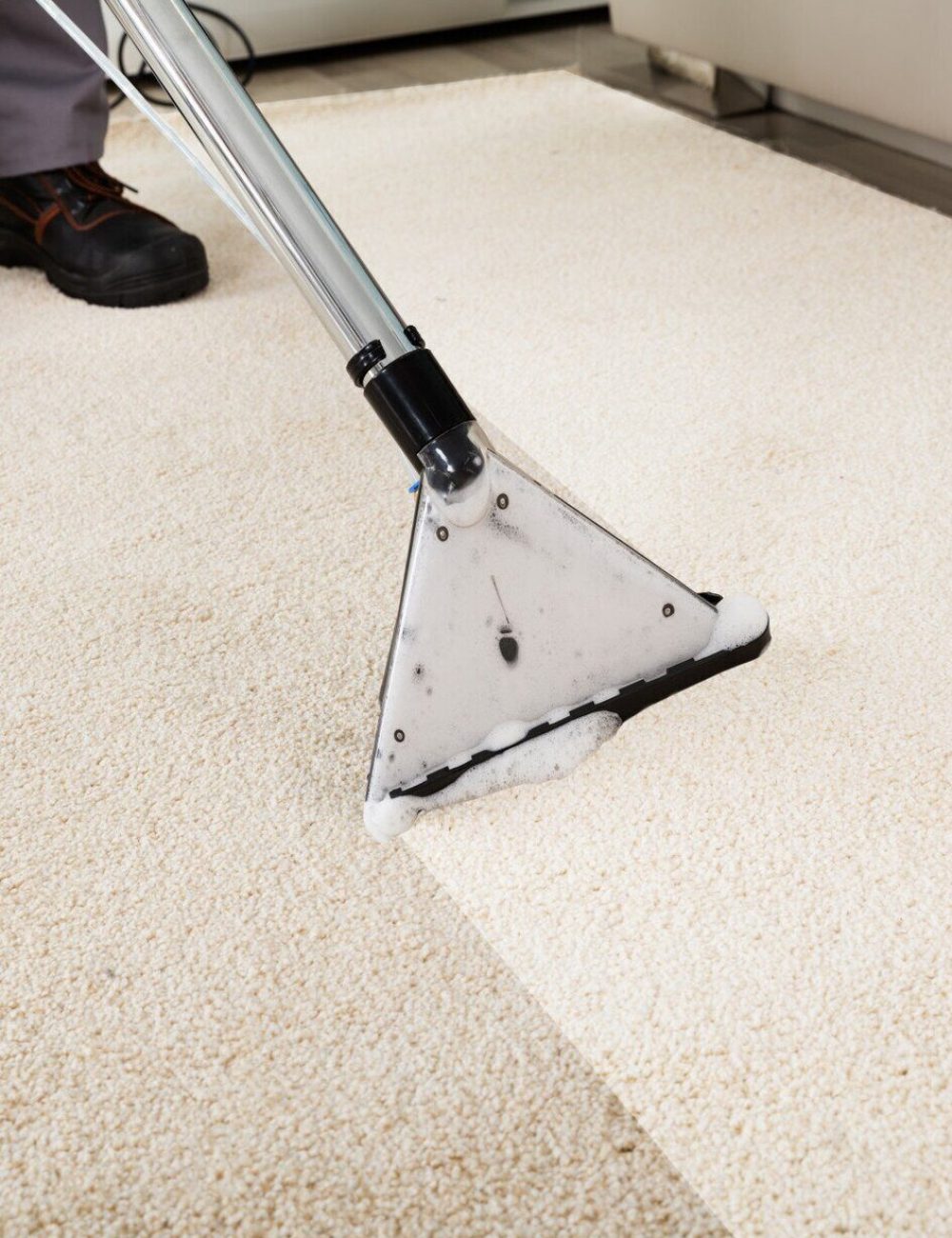 Person-Cleaning-Carpet-With-Va